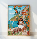Mittelmeerfrau auf Terrasse mit Orangen und Meer