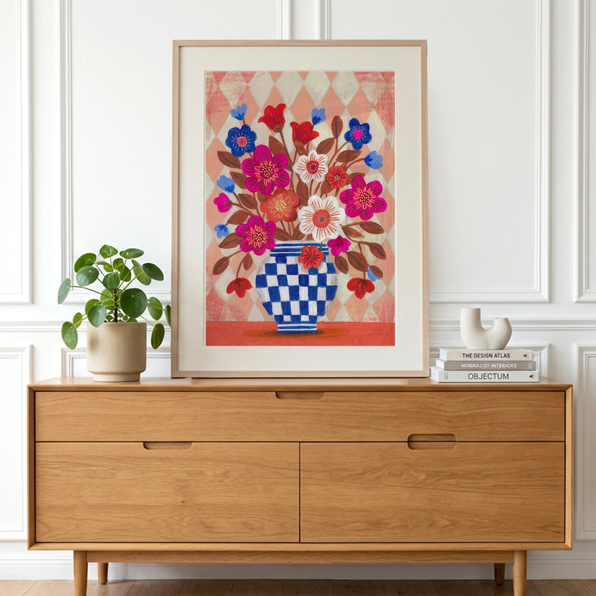 Colorful Floral Vase on Harlequin Pattern Background