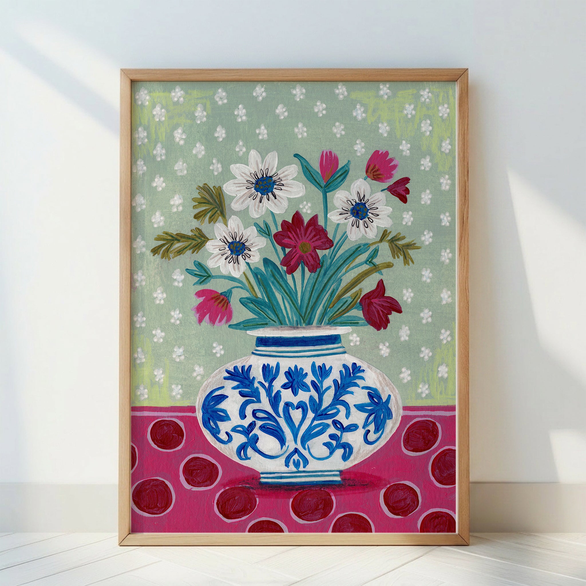 Blue Floral Vase with Wildflowers on Patterned Background